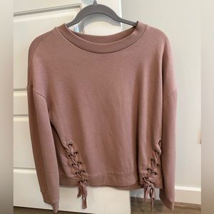 Pink sweater with ties on side!!